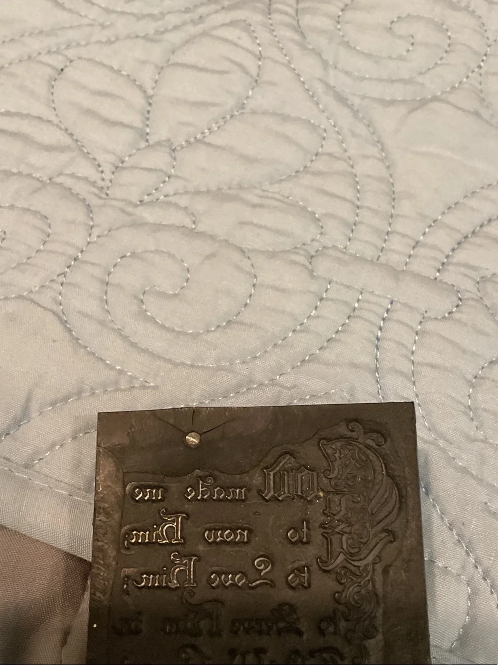 Vintage letterpress printing block.